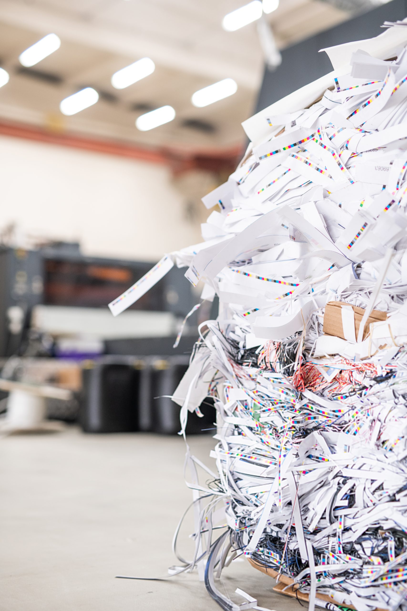Close-up of cut papers heap produced with linotype machine at printing house